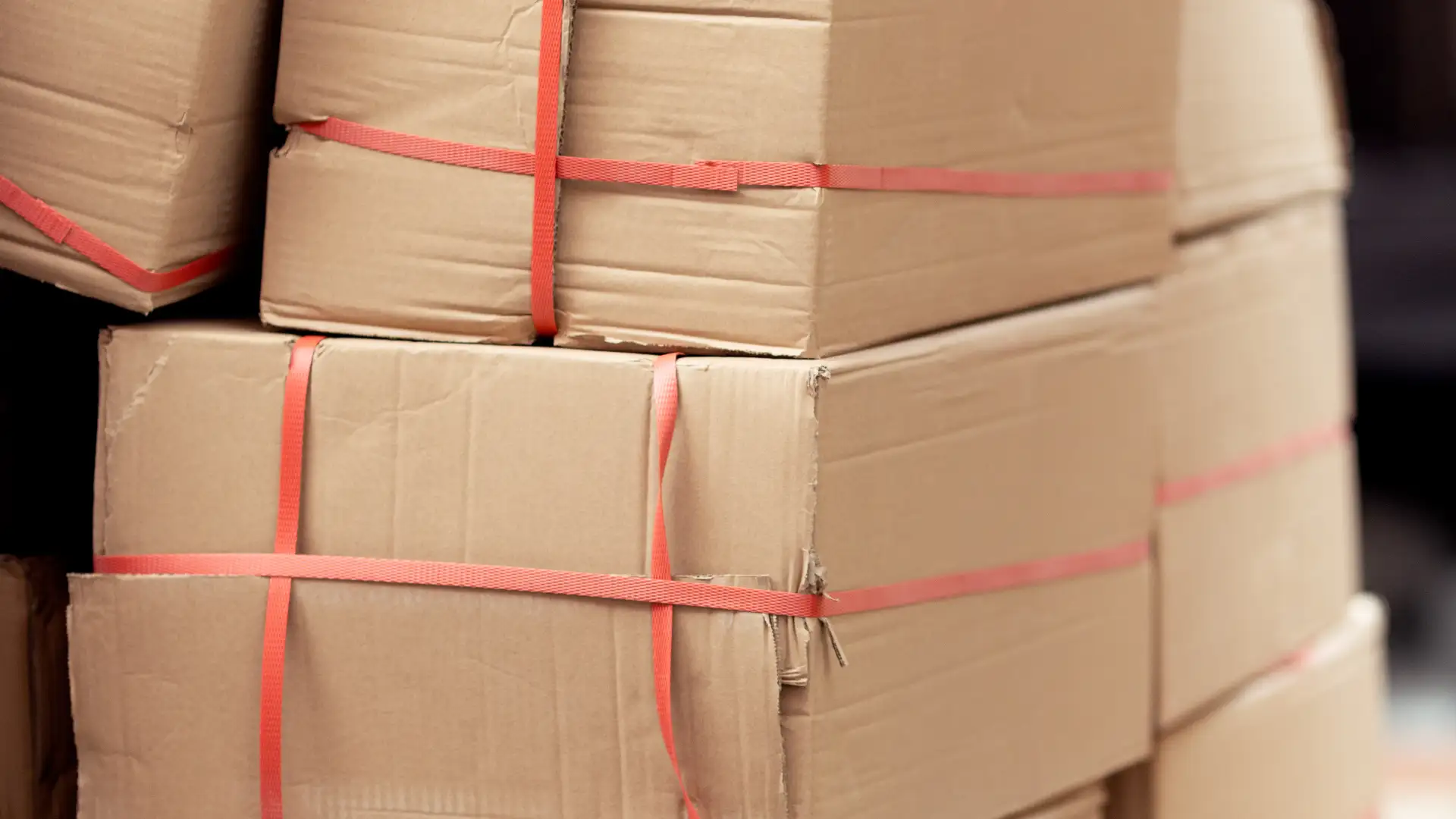 Collapsed stack of retail products in a shipping container