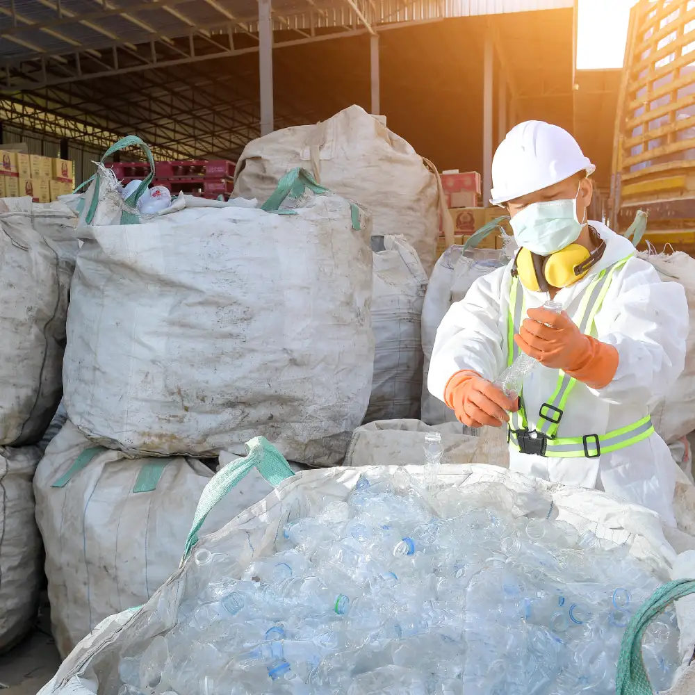 warehouse manager inspecting damaged boxes